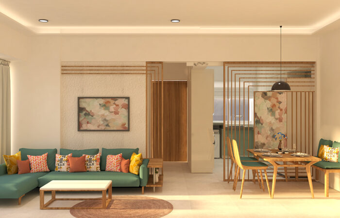 Open plan living and dining area with teal sectional, wooden partition, and contemporary decor