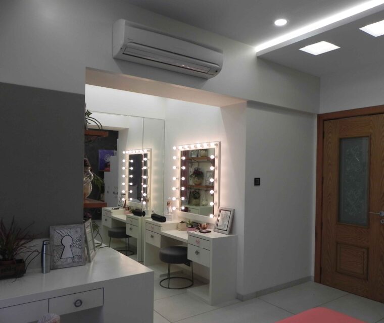 Elegant makeup vanity with mirror lights in modern interior project