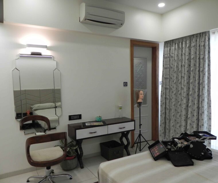 Bedroom corner styling with vanity, mirror, and designer curtains