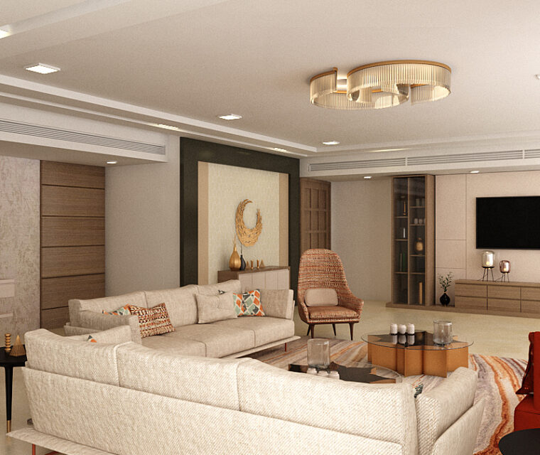 Spacious living room with L-shaped sofas, neutral decor, statement lighting, and modern TV unit