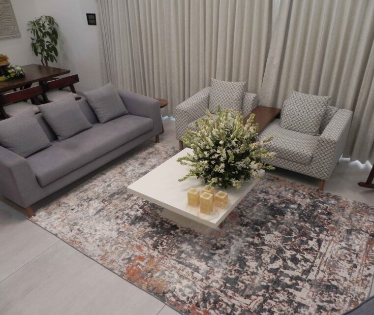 Minimalist living room furniture and flower centerpiece, modern apartment