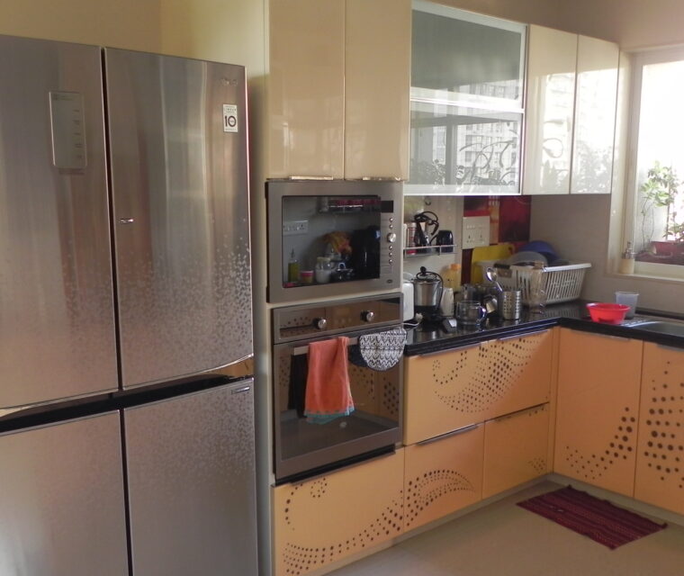 Dining area with wall decor, centerpiece statue, and decorative side drawers