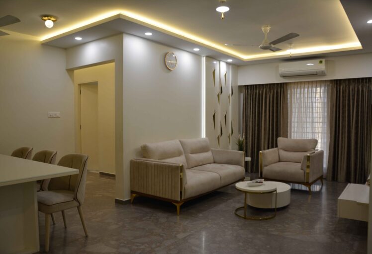 Luxurious living room with plush sofas, accent tables, and LED lighting design