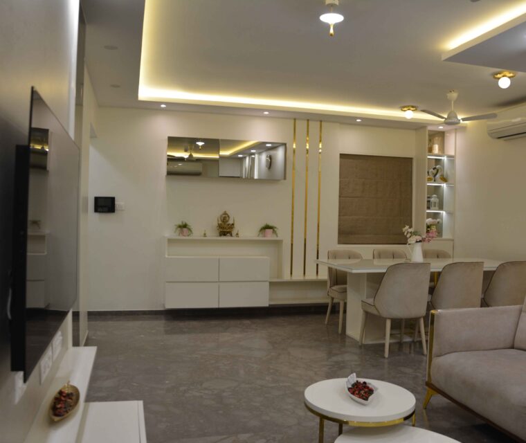 Spacious living room dining area with contemporary furniture and soft furnishings