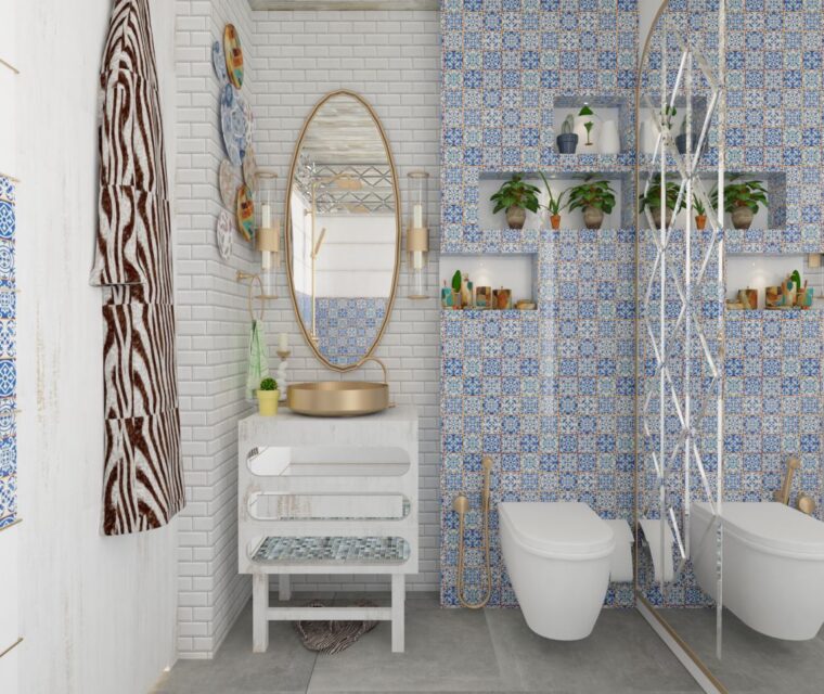 luxury bathroom with gold hardware, blue patterned tiles, oval mirror, and niche plant shelves