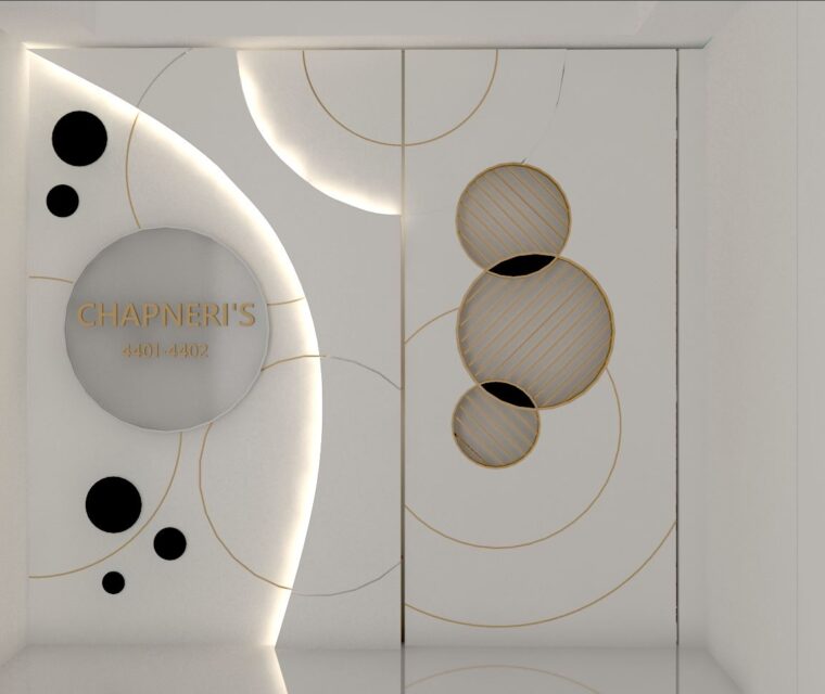 stylish modern entrance with geometric wall patterns and custom signage